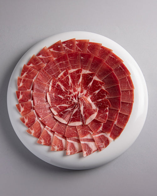 PLATO JAMÓN DE BELLOTA 100% IBÉRICO - CORTE A CUCHILLO 100 GR.